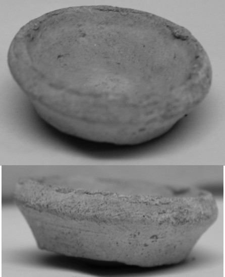 Image for: Small base of a pottery vessel